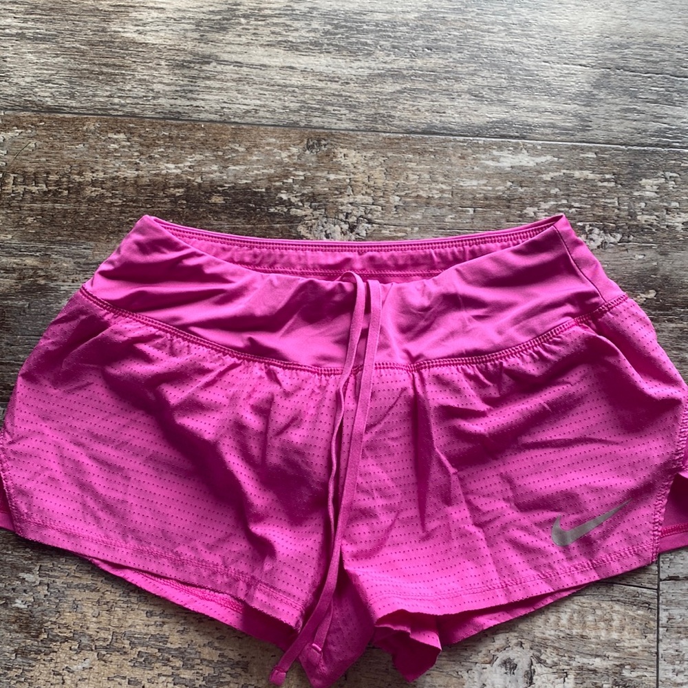 Pink Nike running shorts